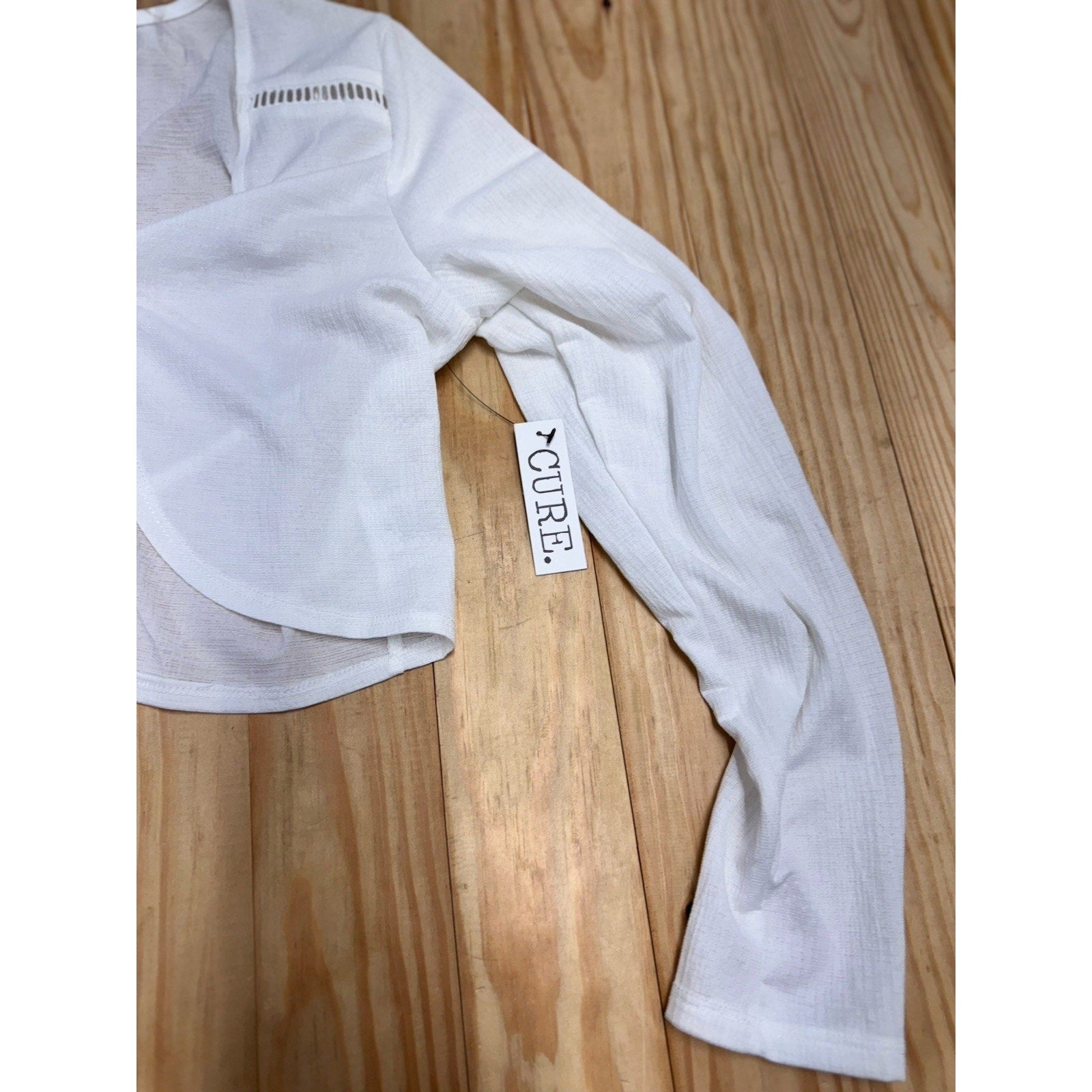 Cure Apparel Women's Cropped White Coverup Size Medium NWT