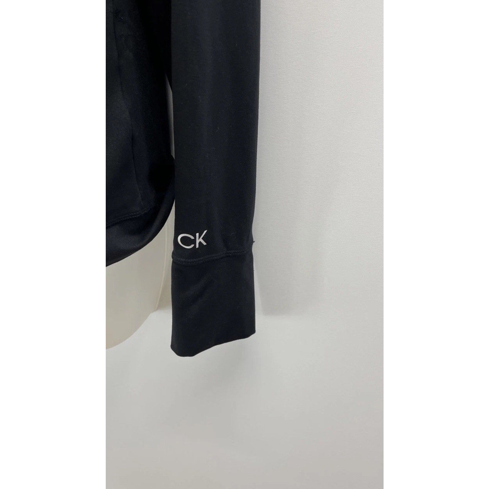 Calvin Klein Performance Black Thumb Hole Hooded Zip Pocket Jacket, Size Medium