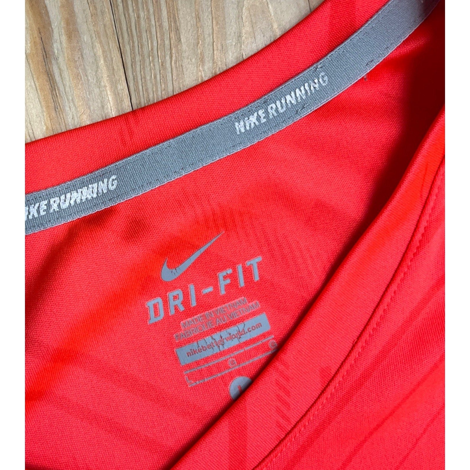 Nike Running Women’s DriFit V Neck Long Sleeve Training Shirt Orange Large