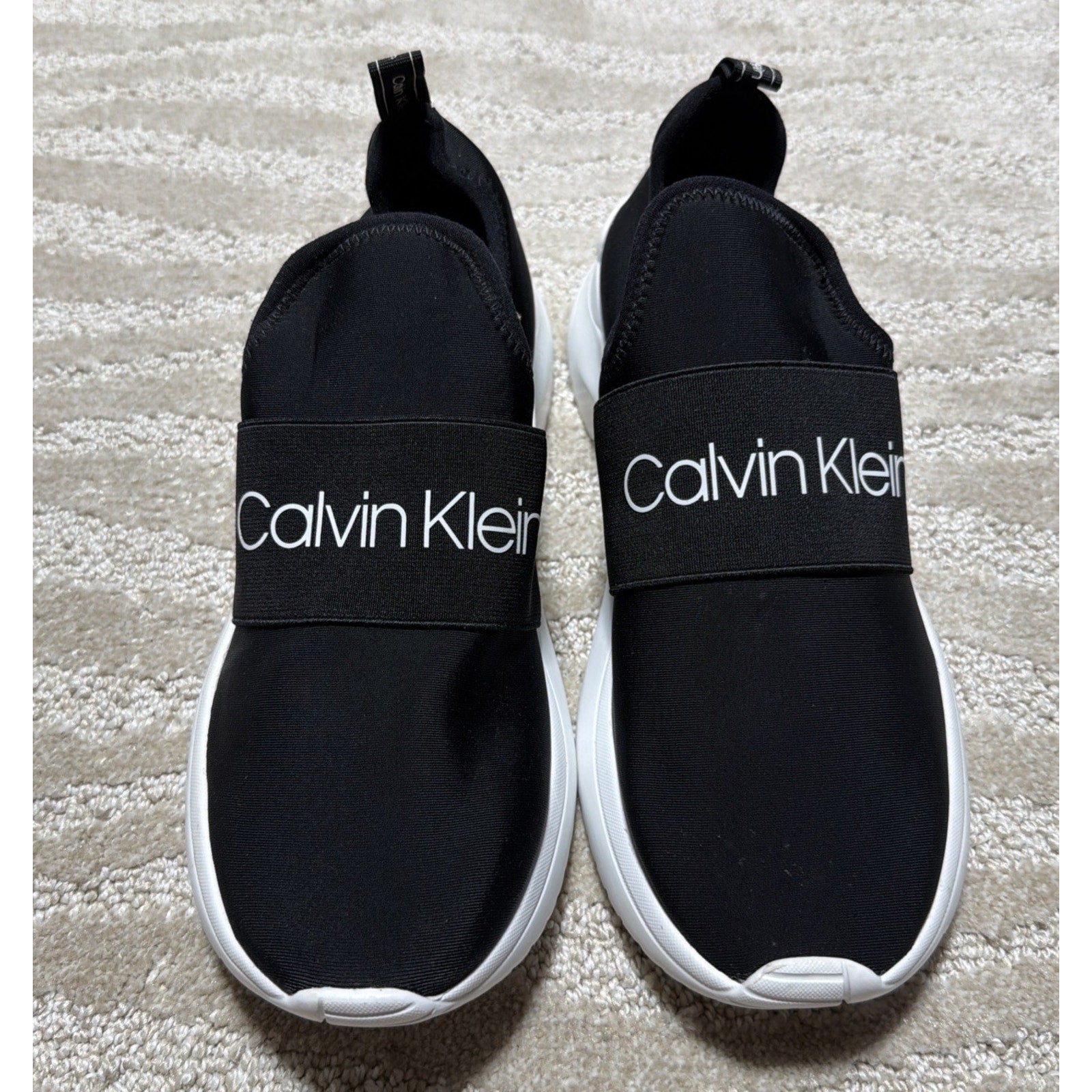 Calvin Klein Women’s Slip-On Uzza Sneakers Black / White Size 10