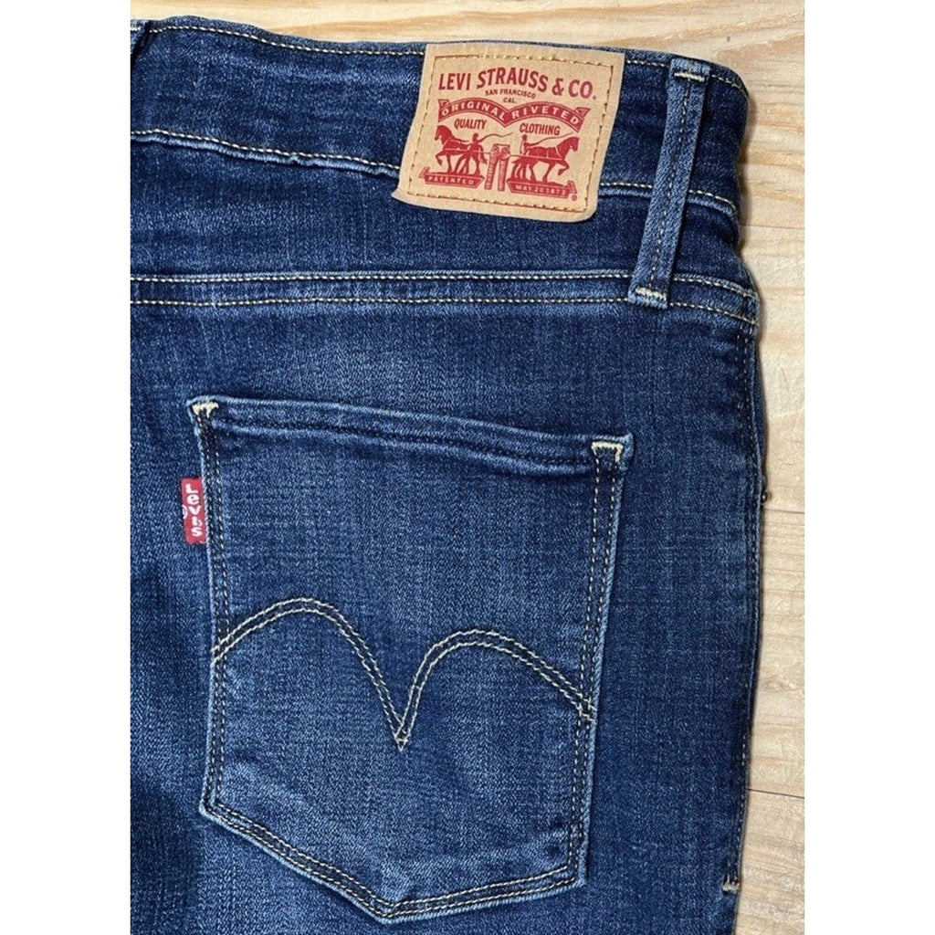 levis classic mid rise skinny jeans womens Size 30 Dark wash blue denim stretch