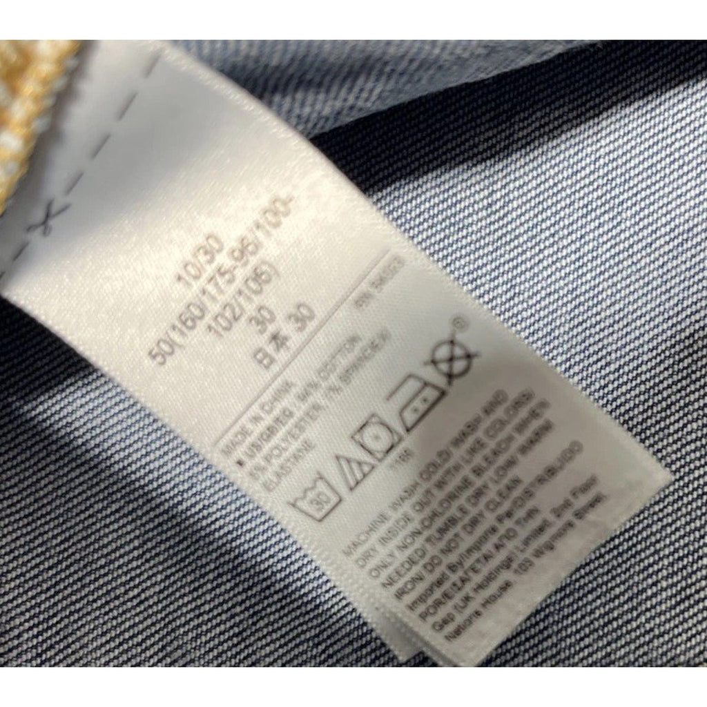 GAP women’s size 10/30 high rise Raw Hem Distressed cigarette jeans